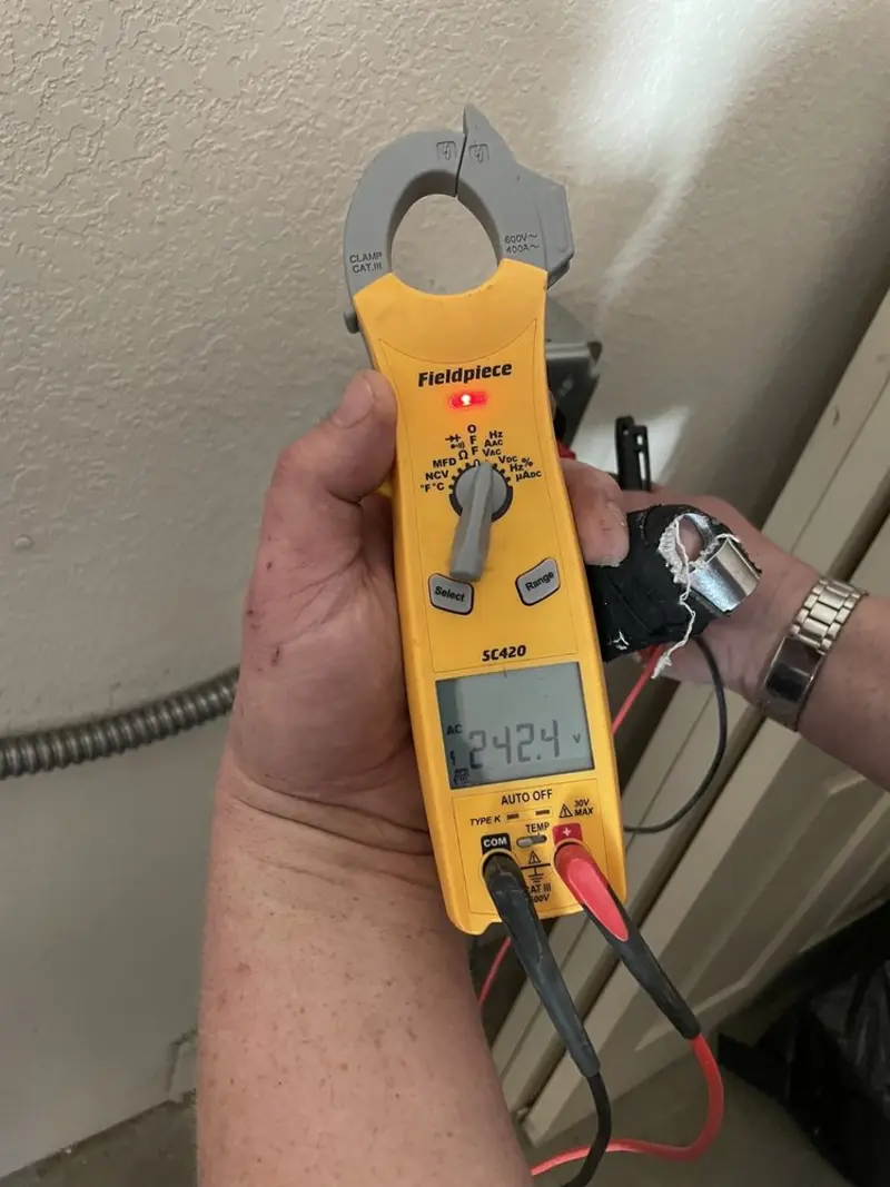 Voltage testing with clamp meter during Generator Installation in Shapleigh